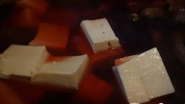 放入豆腐